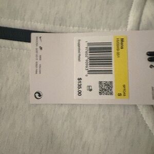 Any brand new Nike techs/With price tag on.